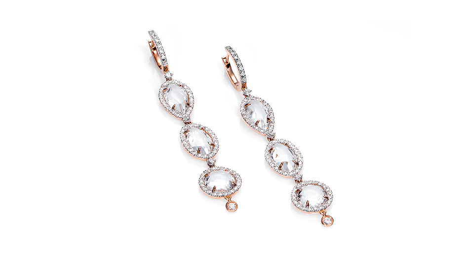 <p>18kt pink gold earrings with crystal rock and diamonds</p>