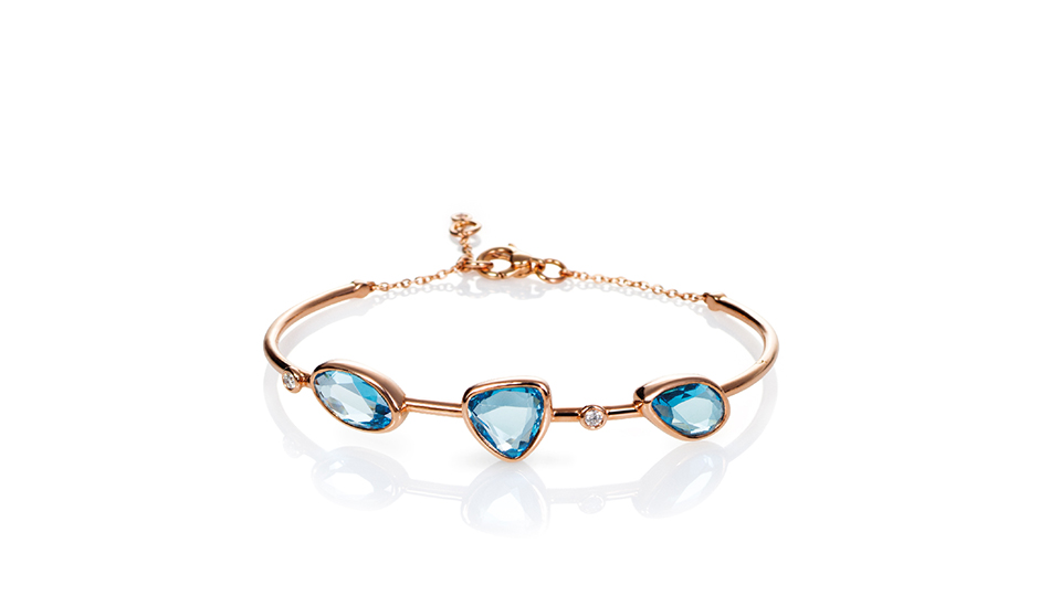 18kt pink gold bracelet with blue topaz and white diamonds