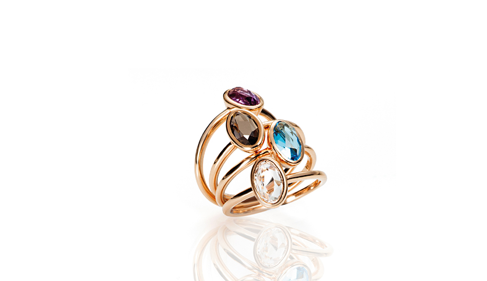 18kt pink gold rings with rhodolite, smoky quartz, blue topaz and crystal rock