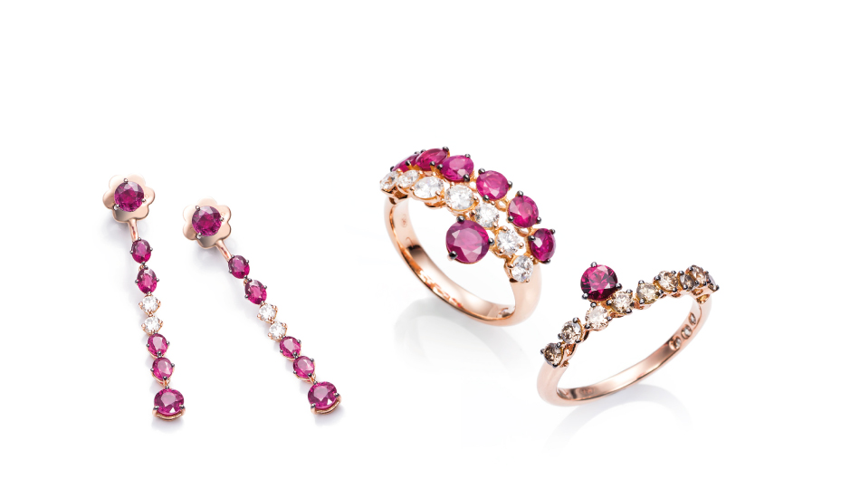 18kt pink gold rings and earrings with rubies and diamonds