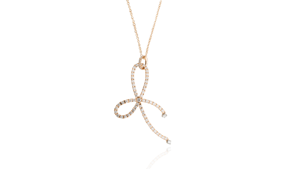 <p>18kt pink gold pendant with white diamonds</p>