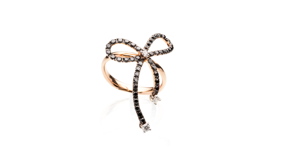 <p>18kt pink gold ring with black and white diamonds</p>